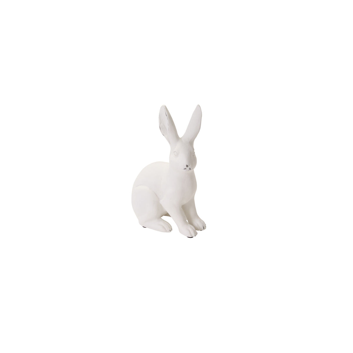 White rabbit figurine on a white background