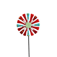 Decorative handmade glass flower with red, blue, and white petals.