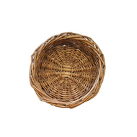 Small woven basket on a white surface