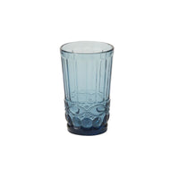 A blue glass drinkware with a textured surface design.
