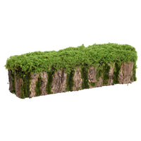Rectangular fake stump with green moss on a white background