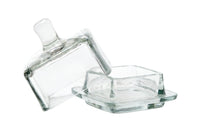 Clear square glass jam jar with lid on a white background