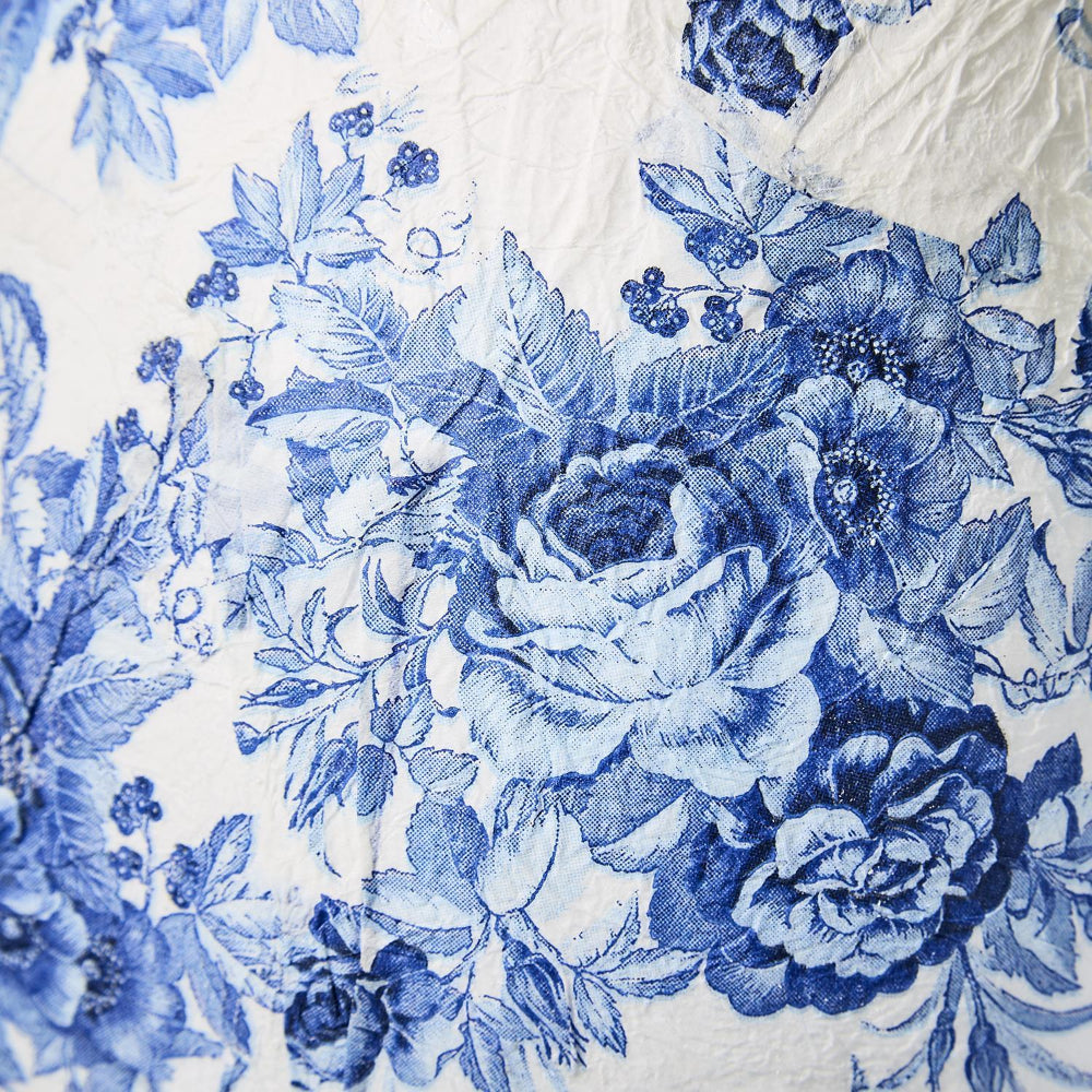 Close-up of blue floral pattern on a white background