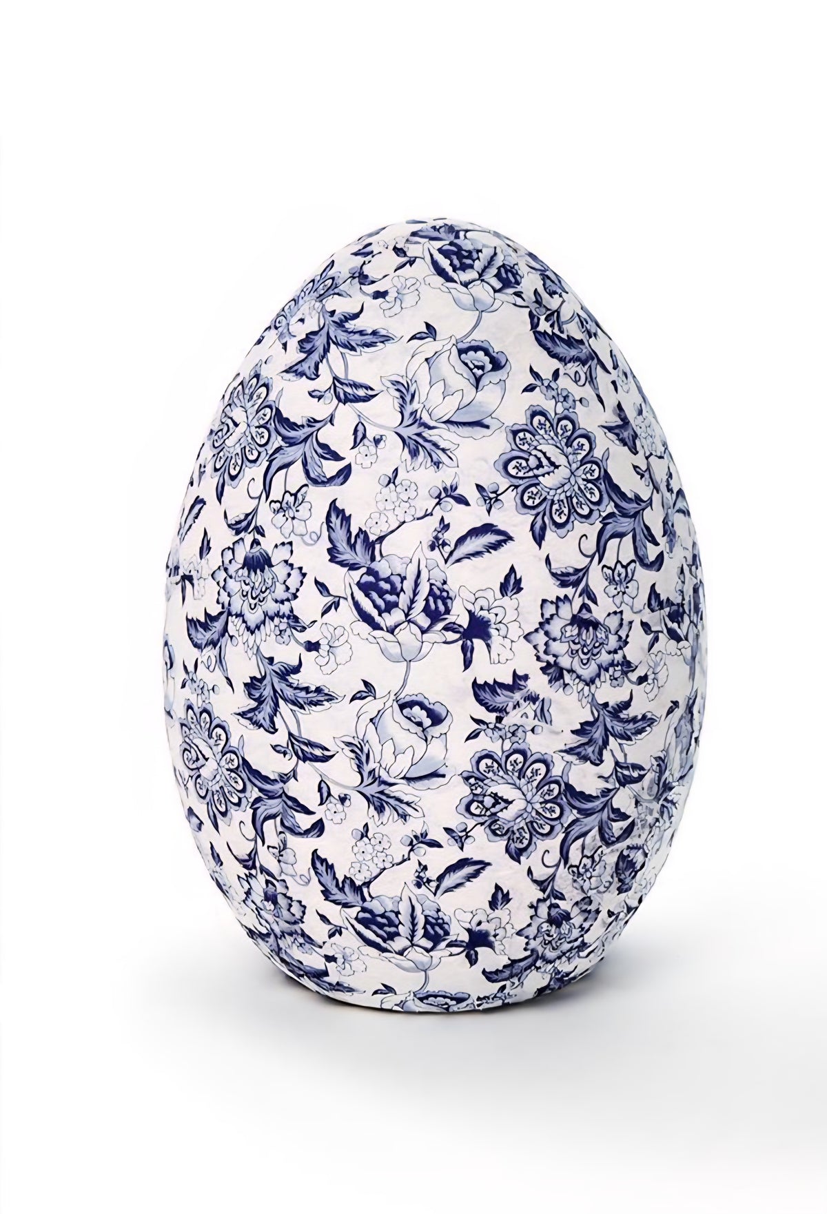 Decorative egg with blue floral pattern on a white background