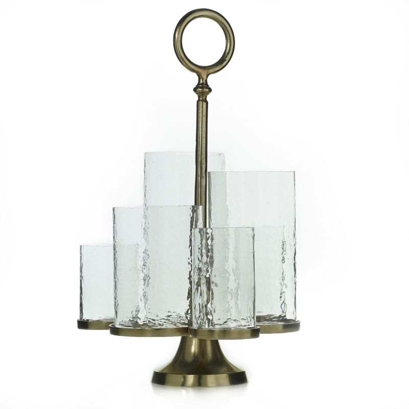 A brass and glass candle holder with five removable glass holders, featuring a circular brass top and base with a decorative element on top.