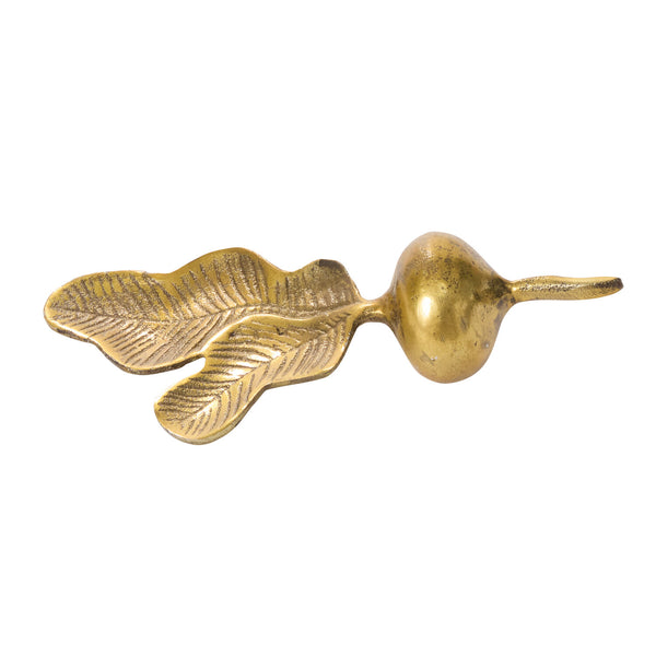 Decorative gilded metal radish figurine on a white background