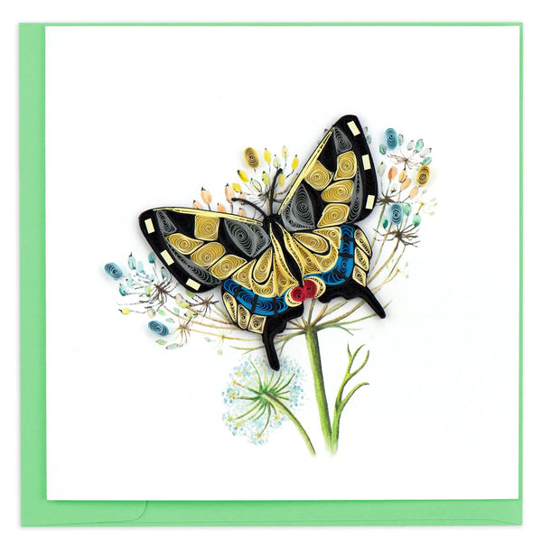 Colorful quilled swallowtail butterfly greeting card on a green envelope on a white background