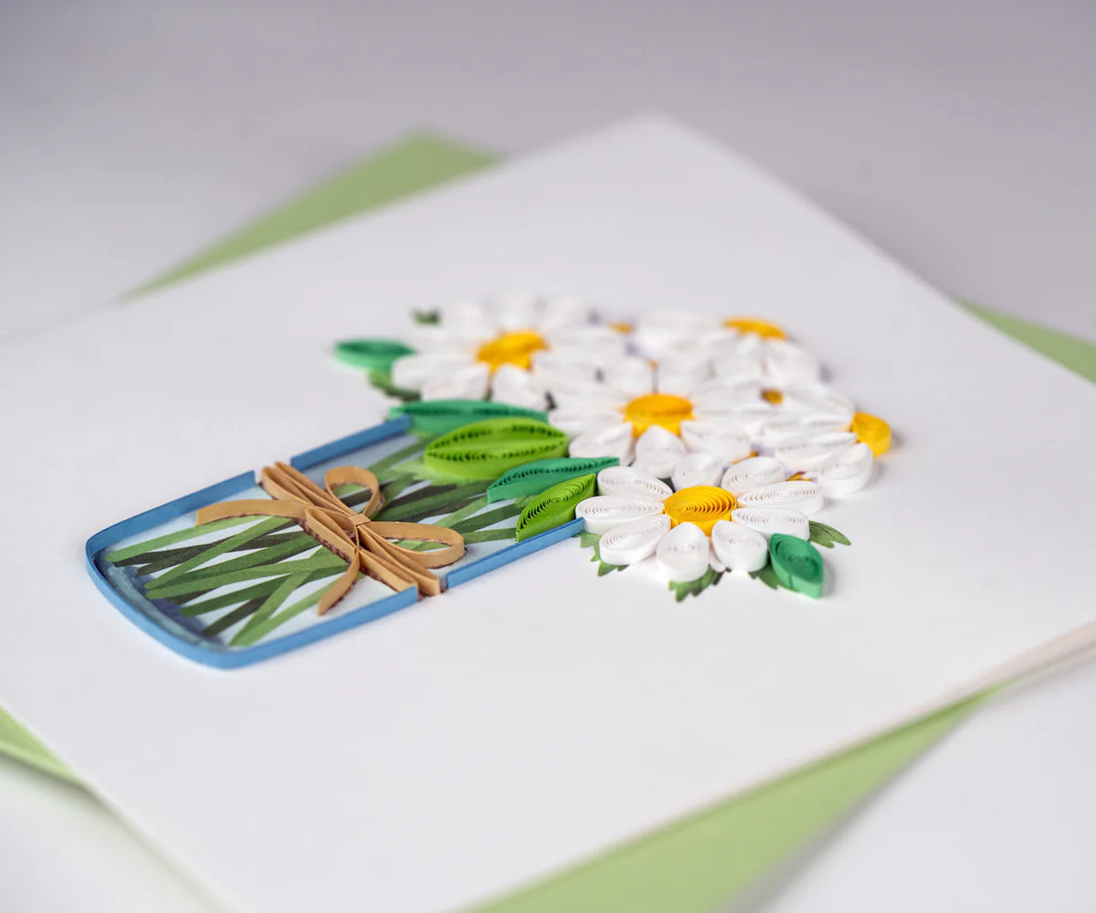 Quilled daisy bouquet greeting card with a green envelope.