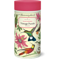 Jigsaw puzzle canister with hummingbird design and pink lid
