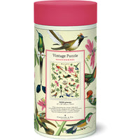Cylindrical puzzle box with vintage hummingbird design and pink lid