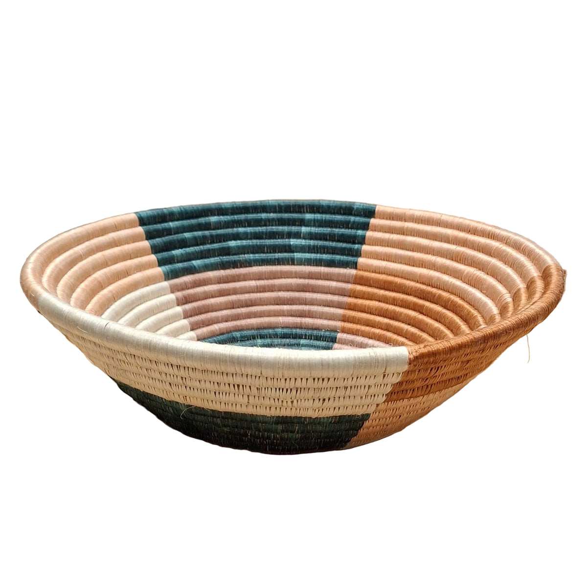 Woven basket with multicolor pattern on a white surface