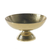 Gold decorative Oscar bowl on a white background