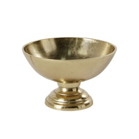 Gold bowl with a pedestal base on a white background