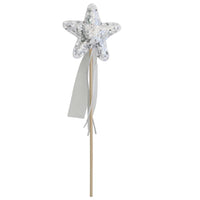 A glittery silver star wand with a wooden stick and white ribbon tails, shown against a plain white background.