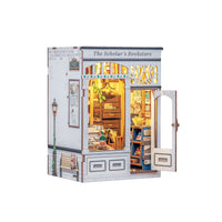 Model of 'The Scholar's Bookstore' with open door on a white background