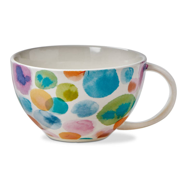 Colorful polka dot mug on a white background