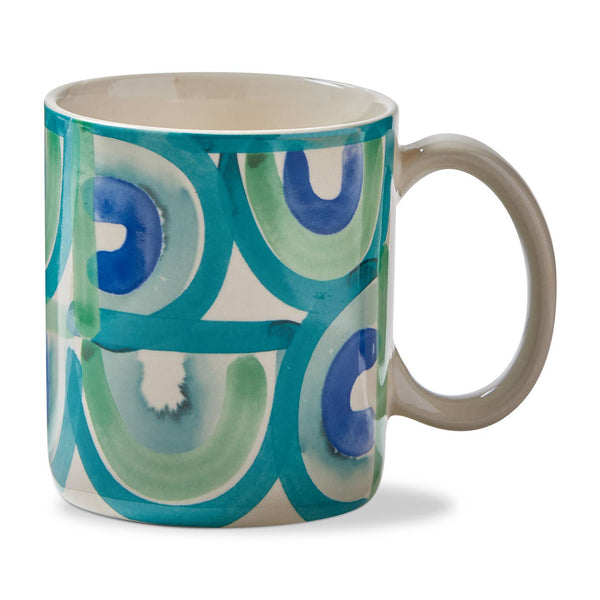 Mug with a blue and green abstract pattern on a white background