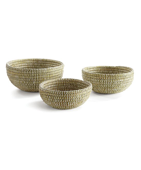 A set of three hand-woven beige rivergrass baskets in varying sizes.